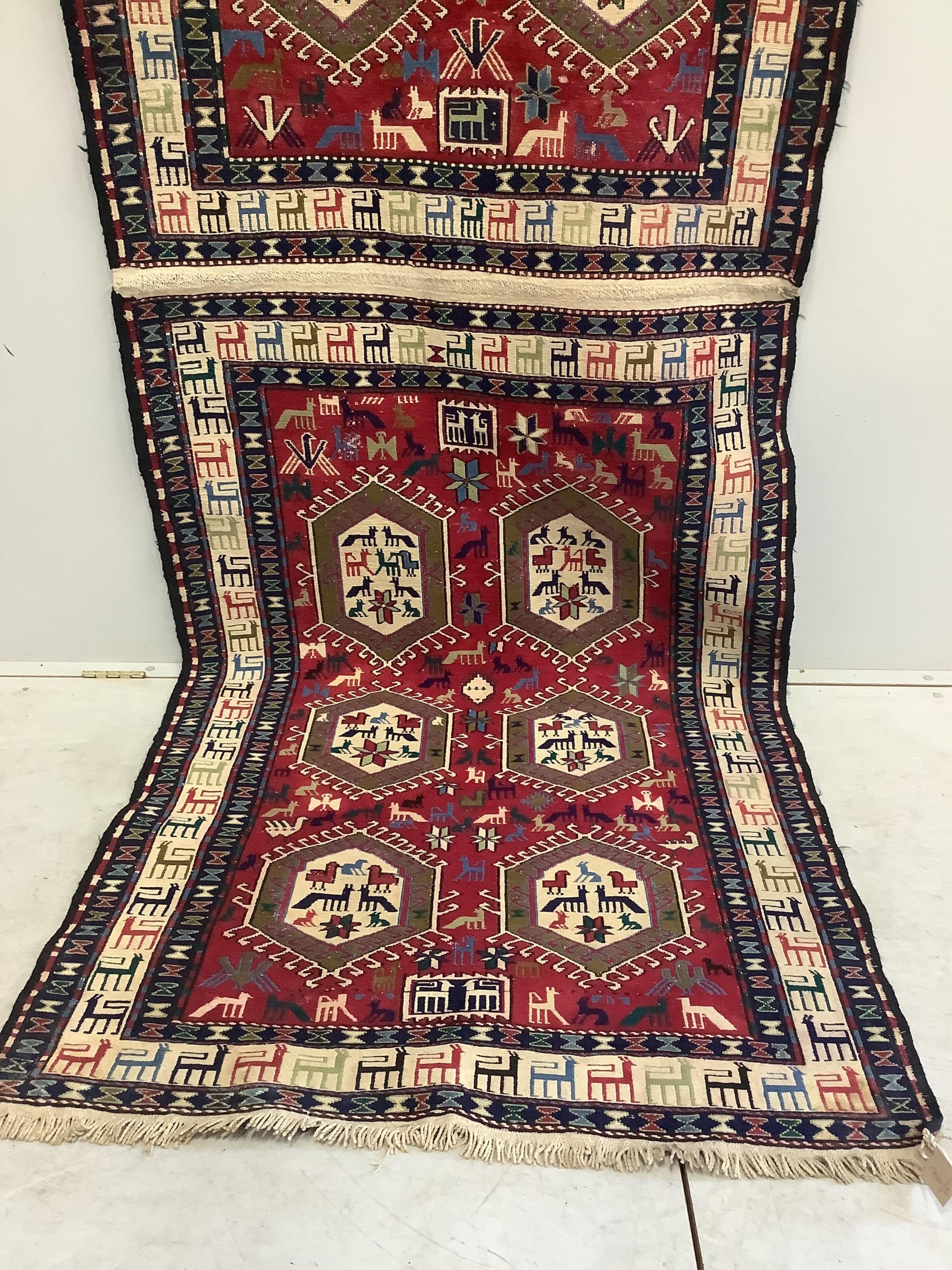 A Soumak flatweave rug, approximately 320 x 108cm. Condition - good